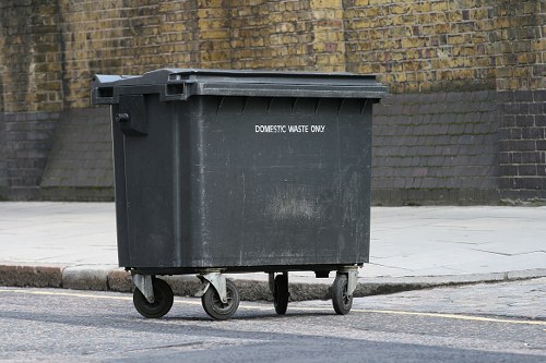 Safety signage and containment at a business waste site